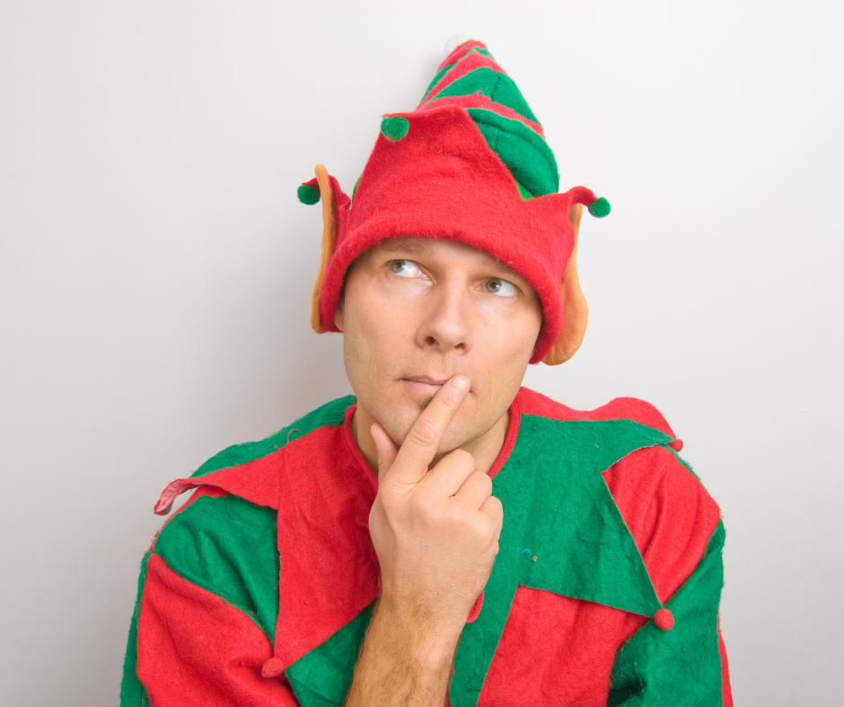 A person dressed as a holiday elf thinking thoughtfully, representing consideration around holiday sales outreach and year-end strategy.