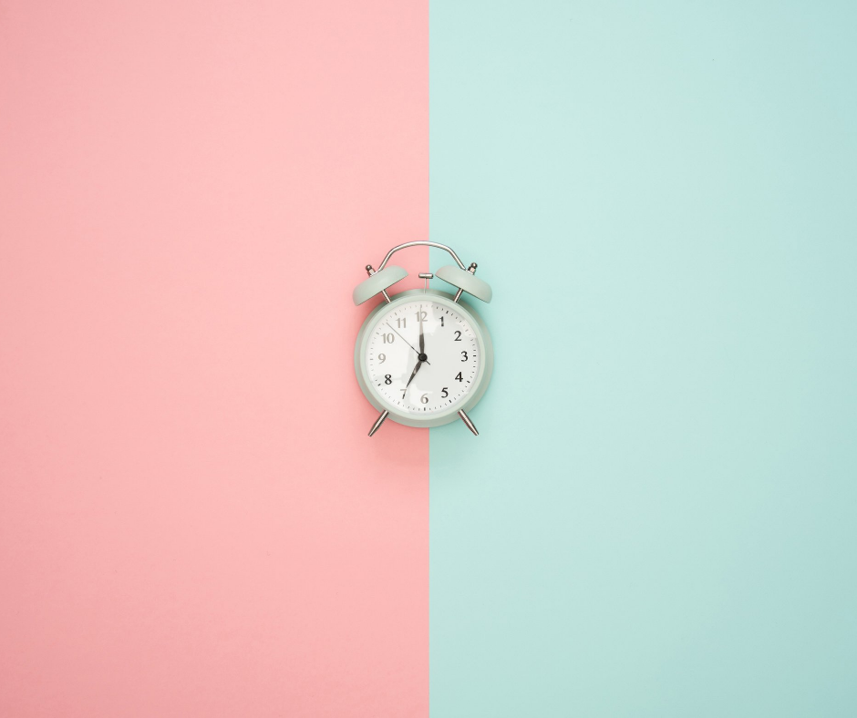 Alarm clock centered between two contrasting backgrounds, representing limited time and competing priorities.
