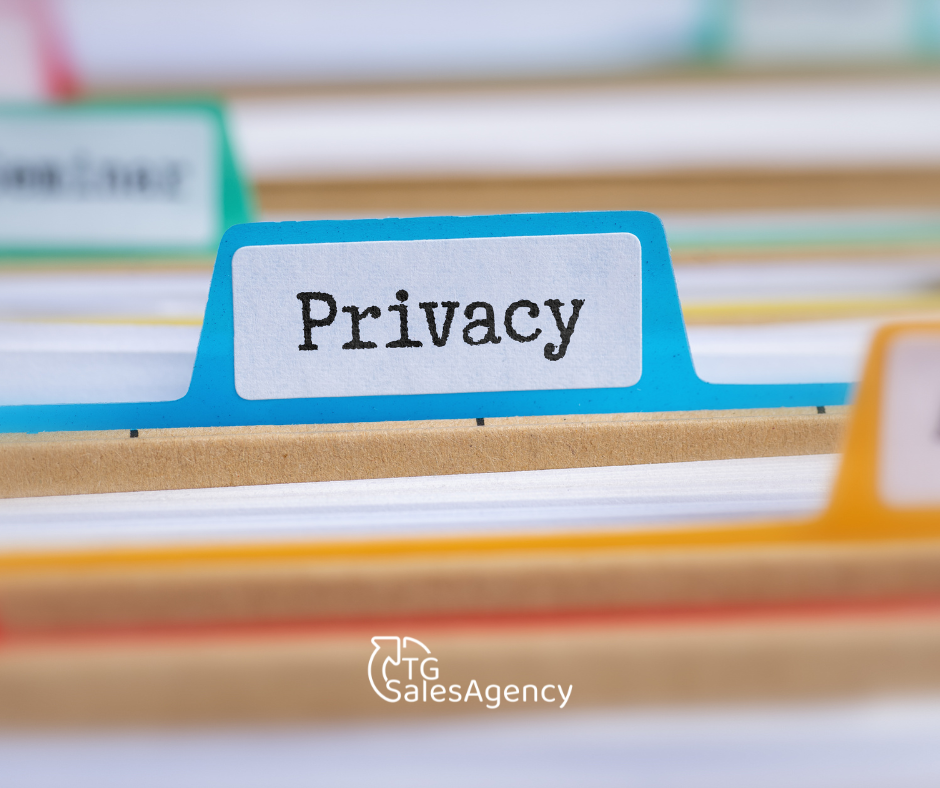 Close-up of a file folder labeled ‘Privacy,’ representing responsible data handling and respecting customer information in B2B sales outreach.