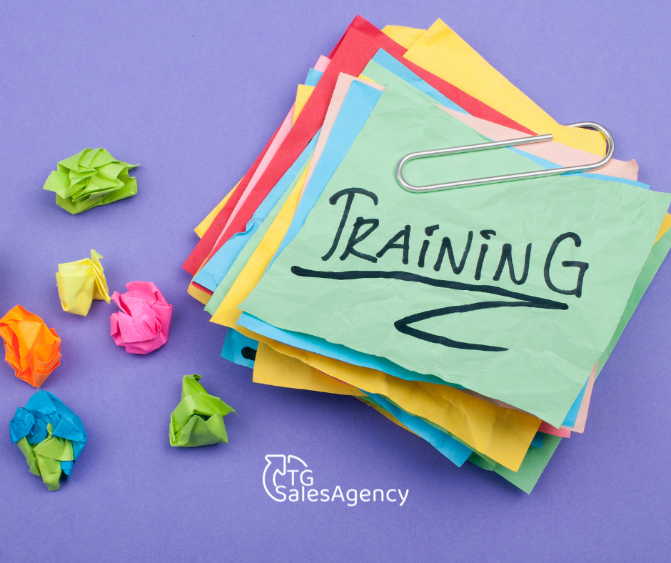 Stack of colorful notes labeled ‘Training,’ representing sales team development, coaching, and skill-building for effective and ethical telemarketing.