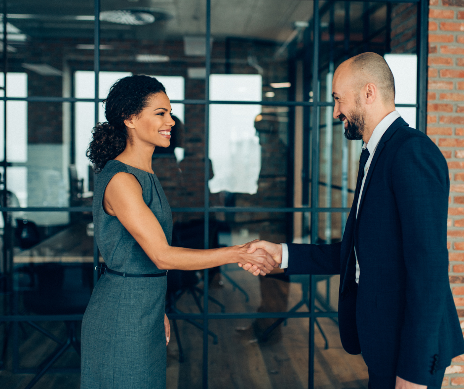 Business development manager closing a deal after successful B2B hyper-targeting and personalized outreach.