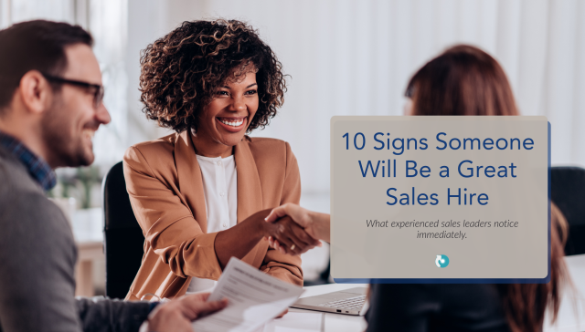Sales leader interviewing a candidate during a business meeting about identifying great sales hires and avoiding bad sales recruiting decisions.